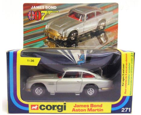 A CORGI NO.271, JAMES BOND ASTON MARTIN silver, mint, complete with two assassin figures in unopened packet, boxed, the box g