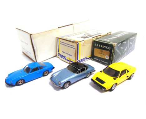 [WHITE METAL]. THREE 1/43 SCALE MODEL CARS  comprising an SMTS The Racing Line No.4, 1957 Lotus Elite, metallic blue with a b