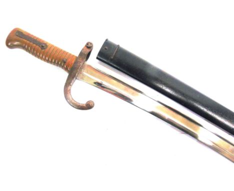 A FRENCH M1866 'CHASSEPOT' YATAGHAN SWORD BAYONET  the 57.5cm steel blade inscribed to the back-edge 'Tulle Fevrier 1872', wi