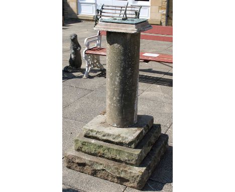 A Weathered Sandstone Sundial, the square top supported by a cylindrical column on a triple-stepped square plinth base, 65cm 