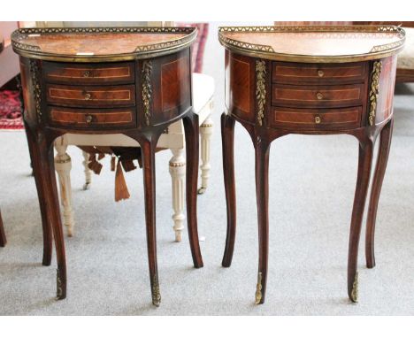 A Pair of Reproduction Demi-lune Lamp Tables, inlaid and gilt metal mounted, with brass gallery, three drawers and raised upo