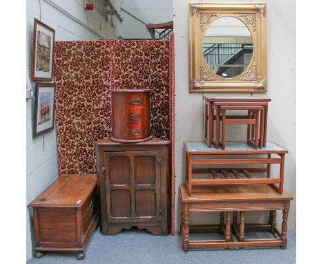 A Group of 20th Century Furniture, comprising - a circa 1930's oak ottoman, a modern circular mahogany three height bedside c