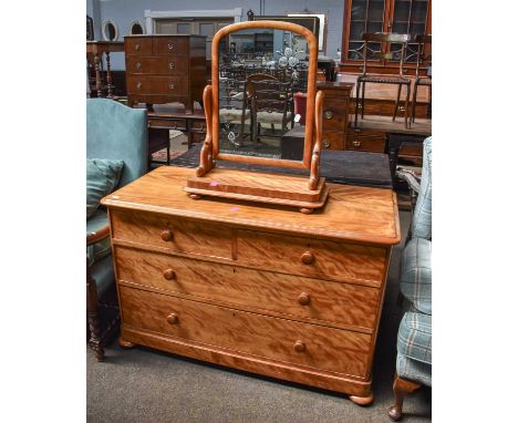 A Satinwood Three Height Chest of Drawers, 123cm by 56cm by 80cm; together with a Satinwood dressing table mirrorChest - Larg