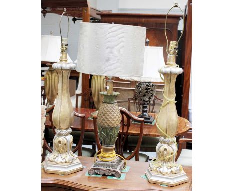 A Pair of Giltwood Table Lamps, with acanthus leaf decoration and a further lamp in the form of a pineapple (3)- transformer 