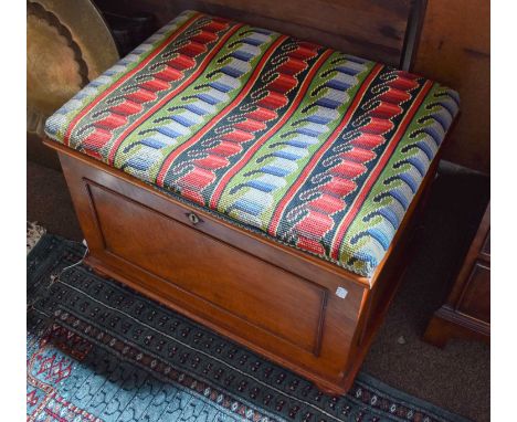 A Victorian Mahogany Box Stool, with tapestry overstuffed seat and on compressed bun feet, together with an Indian brass topp
