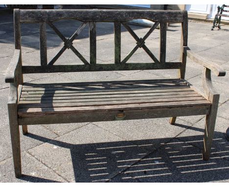 A Wooden Slatted Garden Bench by Pagoda