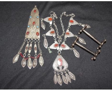 Two Turkmen carnelian decorated jewellery pieces including metal linked necklace, set with six carnelian, with a carnelian se
