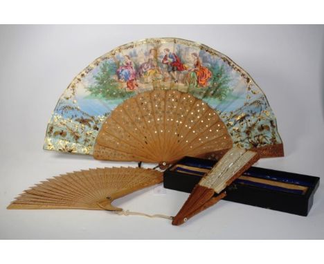 Three vintage wooden fans on in original box (damage)