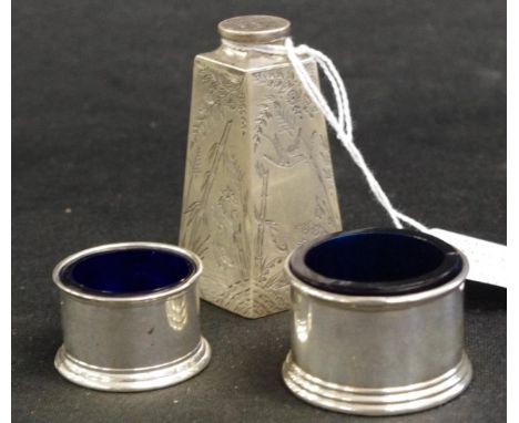 Three vintage sterling silver condiment pieces including graduated pair open salts, Birmingham 1932, and 1935, each with blue