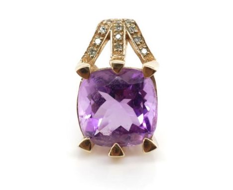 Amethyst and diamond set 9ct yellow gold pendant marked 9k. Approx weight 2.4 grams