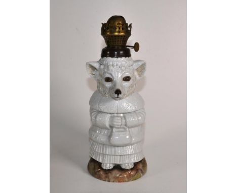 German C19th porcelain oil lamp Little Red Riding Hoods 'The Wolf', circa 1880, chip to base, 31cm high approx.