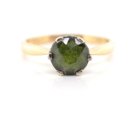 18ct yellow gold and solitaire green gemstone ring the stone tests as spinel. Marked 18ct. Approx weight 2.5 grams, ring size