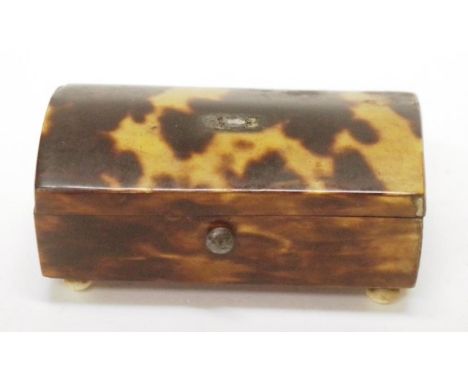 Antique tortoiseshell snuff box on four ivory bun feet, (loss of small brass shield to lid), (length 6cm approx).
