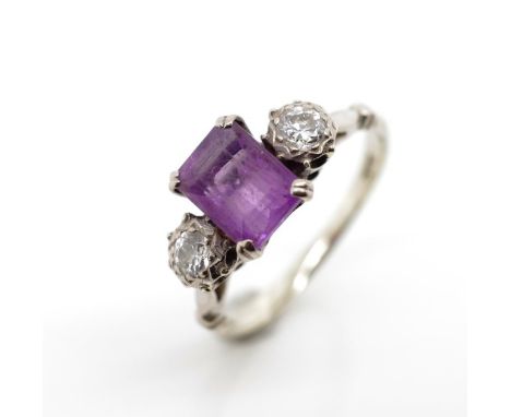 Amethyst and diamond set 18ct white gold ring marked 18ct. Approx weight 3 grams, ring size O