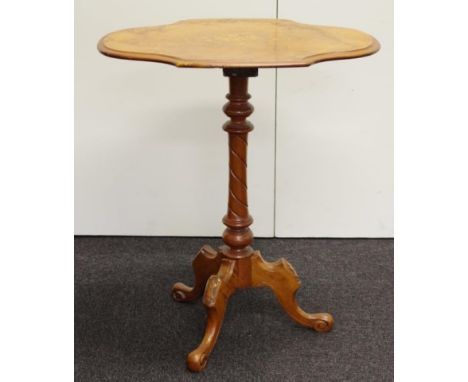 Late Victorian walnut lamp table with floral inlaid top supported by a turned fluted pedestal and 3 carved legs, 56cm x 38cm,
