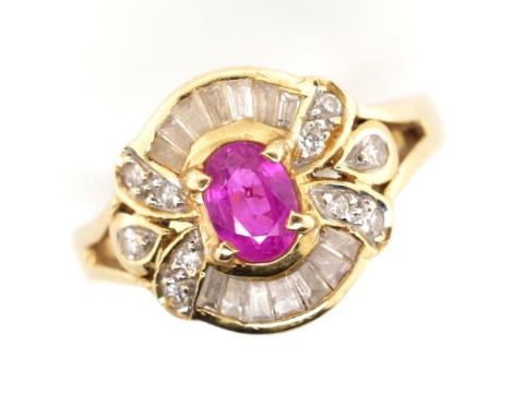 Pink sapphire and diamond 18ct gold cluster ring unmarked to yellow gold mount and shank.  Approx 4.3 grams weight, ring size