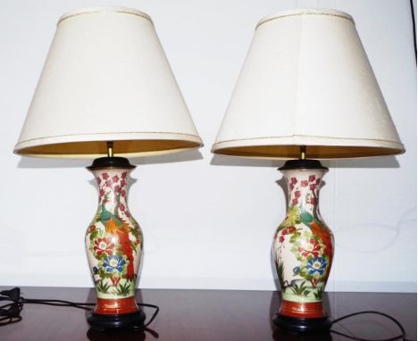 Pair Chinese crackle glaze ceramic lamp bases each with painted floral decoration, with character marks below, fitted for ele