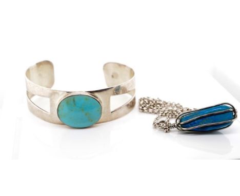 20th century silver bangle and necklace includes a treated turquoise set bangle and a blue stone pendant. both marked 925. Ap