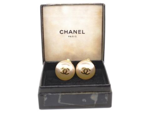 Vintage Chanel clip on earrings classic double cc. Marked with box
