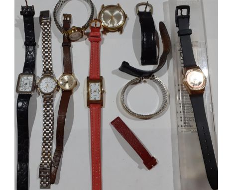 A group of wristwatches to include a late 20th Century Christian Dior stainless steel ladies watch and a Swatch watch in orig