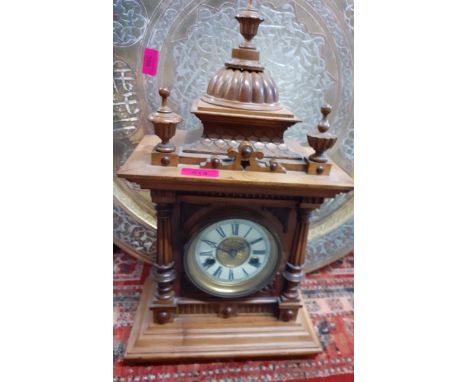 A late 19th century German 8 day walnut mantle clock of architectural form, Location: RAM 