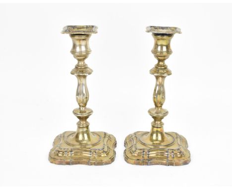 A pair of Elizabeth II silver candlesticks by Mappin &amp; Webb, Sheffield 1963, with moulded sconce, on knopped stems above 