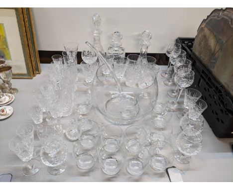 Mixed glassware to include a punch bowl, ladle and glasses, decanters and other mixed glassware 