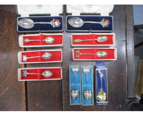 Silver and silver plated spoons to include two silver and enamel cased spoons 