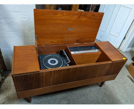 A retro Ferguson teak cased record player and radio, on square tapered legsLocation: G 