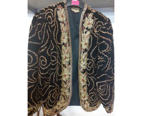 Frank Usher-A late 20th Century heavily beaded black velvet ladies jacket, size m, 36" chest X 60" long. Location:Rail2 