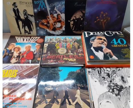 A quantity of LP's, mainly 1970's-1980's, to include Fleetwood Mac, Boney M, The Beatles, Blondie and Abba.Location: 