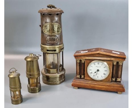 Vintage miner's lamp marked E Thomas & Williams Ltd, Aberdare, together with two miniature brass miner's lamps and a modern a
