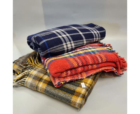Three vintage check blankets in different colours, two with fringe. (B.P. 21% + VAT) 
