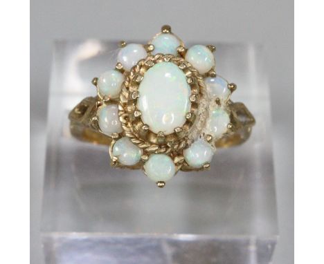 9ct gold opal flower head cluster dress ring.  Size L1/2.  3.5g approx.  (B.P. 21% + VAT) 