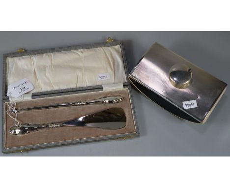 Engine turned silver topped ink blotter together with a cased set of button hook and shoe horn with silver handles. (2) (B.P.