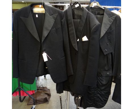 Three vintage black men's suits; one 30's three piece suit, a 1930's tailcoat and trousers and a Hector Powe, Regent St, Lond