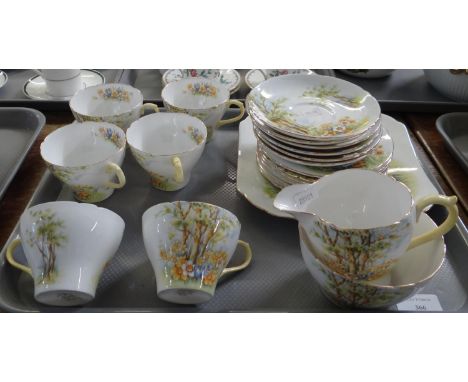 Tray of Shelley English bone china 'Daffodil Time' 13370 teaware to include: six cups and saucers, six cake plates, rectangul