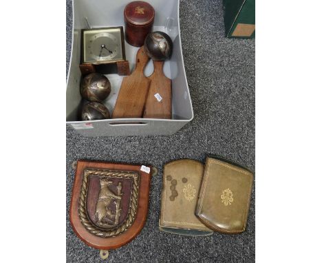 Box of assorted items to include: butter pats, leather bookends, leather lidded pot with fleur de lis decoration, an Elliott 