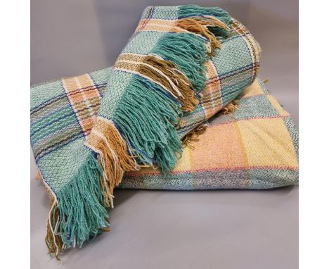 Two vintage check blankets or carthen with fringed edges. (2) (B.P. 21% + VAT)  Yellow/peach/green - some light brown stains 