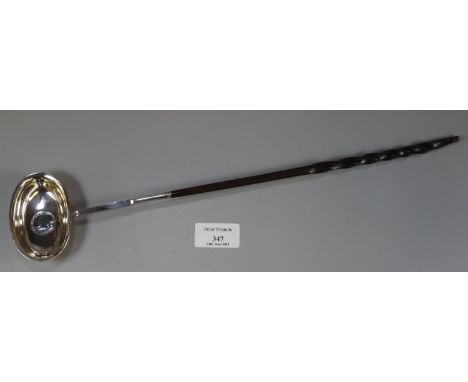 Silver brandy/toddy ladle inset with Latin coin dated 1787.    (B.P. 21% + VAT) 