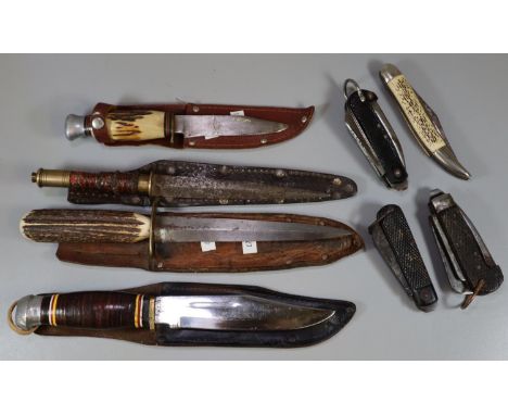 Box comprising three WWII British Army Jack Knives and fisherman's pocket knife together with four daggers with sheaths.  (B.
