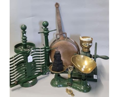 Collection or reproduction cast iron and cast metal kitchenalia items to include: coffee grinder, bookstand, set of scales, a