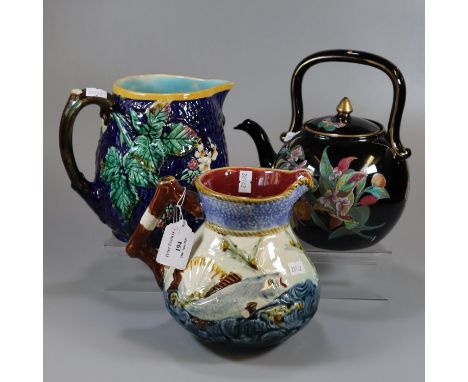 Victorian Wedgwood Majolica, cobalt blue ground single handled jug decorated with berries, flowers and foliage, impressed mar
