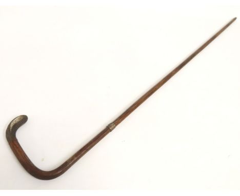 A late Victorian walking cane with 1901 Birmingham silver collar & tip by J. Howell & Co. Ltd, 908mm