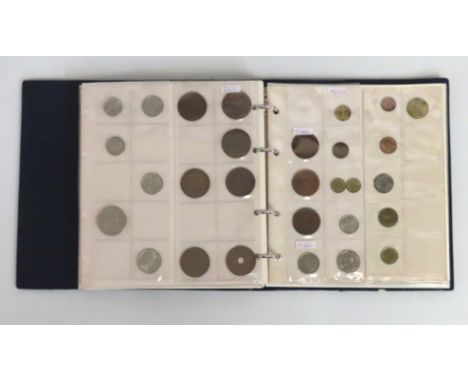 An album of various coins, 16 pages covering Tibet, Timor, Thailand, South Africa, South Arabia, Somalia, Sudra, Sumatra, Taj
