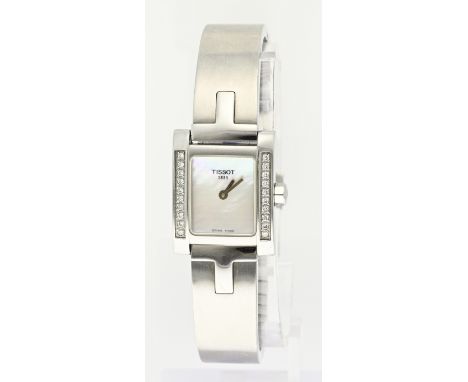 Tissot watch, ladies' model with diamond. Model L951. Quartz. Steel model with a rectangular case set on both sides with 10 s