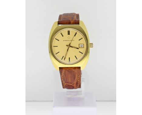 Vintage watch, Eterna automatic, double with a round contoured case with a matte and shiny finish. The watch has a gold-color