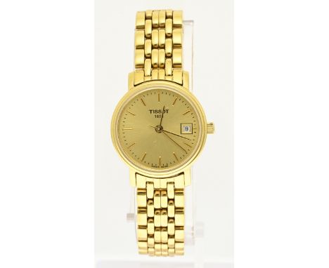 Tissot watch, ladies, gold-plated steel. Model T825/925. Quartz. Round case, Ã¸ 24 mm, with a gold-colored dial with date dis