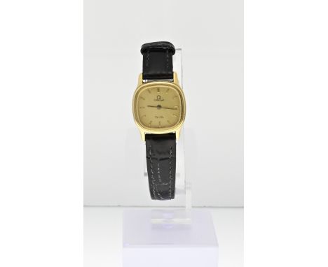 Vintage Omega de Ville watch, ladies model double with a black leather strap. Square contoured case with a gold-colored dial.