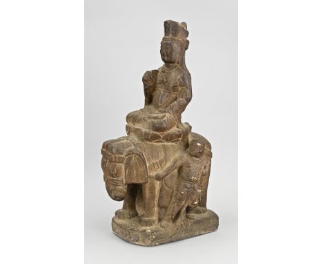 Antique Chinese natural stone Buddha figure sitting on elephant. First half 20th century. Dimensions: In good condition.&nbsp